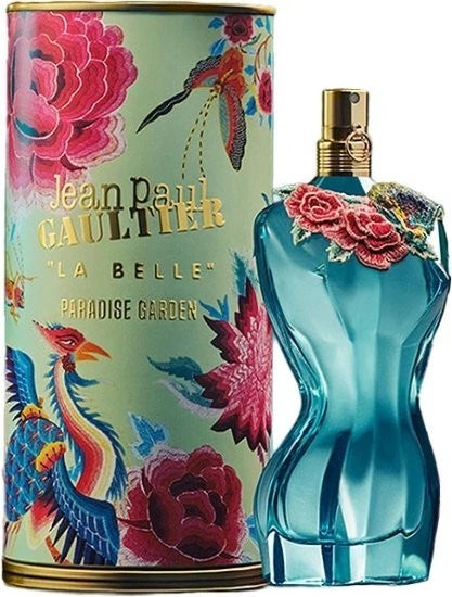 Jean Paul Gaultier La Belle Paradise Garden Eau de Toilette bottle in a distinctive blue hourglass shape, shown next to its illustrated cylindrical packaging box featuring vibrant pink flowers and colorful birds.