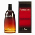 Dior Fahrenheit Eau de Toilette bottle next to its black and red packaging box, featuring a gradient amber-to-yellow glass bottle and white lettering.