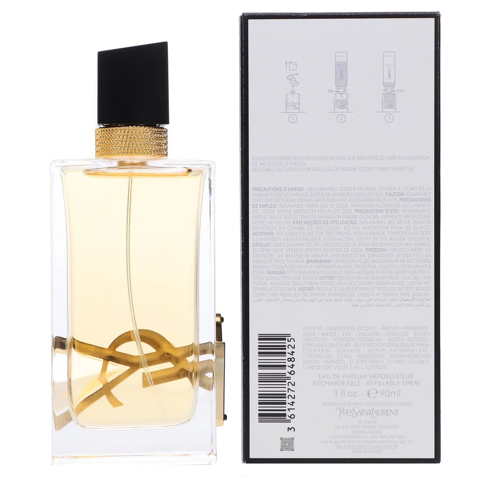 Perfume bottle with gold cap and label next to its packaging on a white background